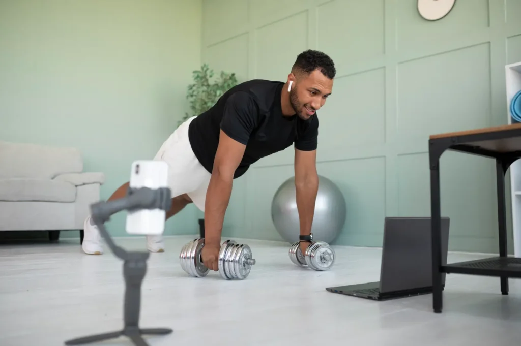 full-shot-smiley-man-training-with-laptop